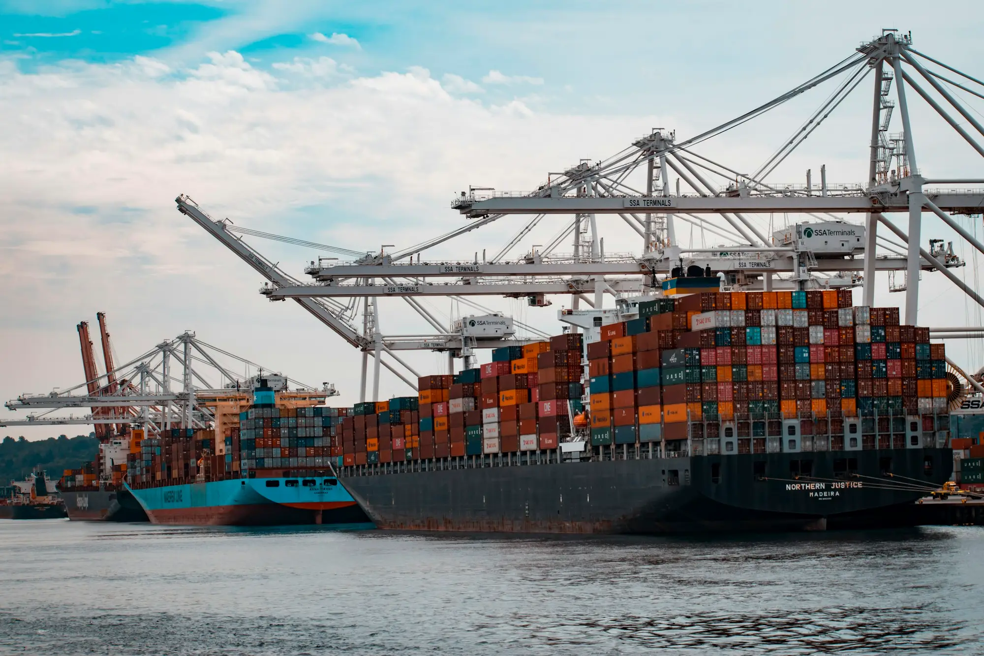 Gantry cranes loading a container ship
