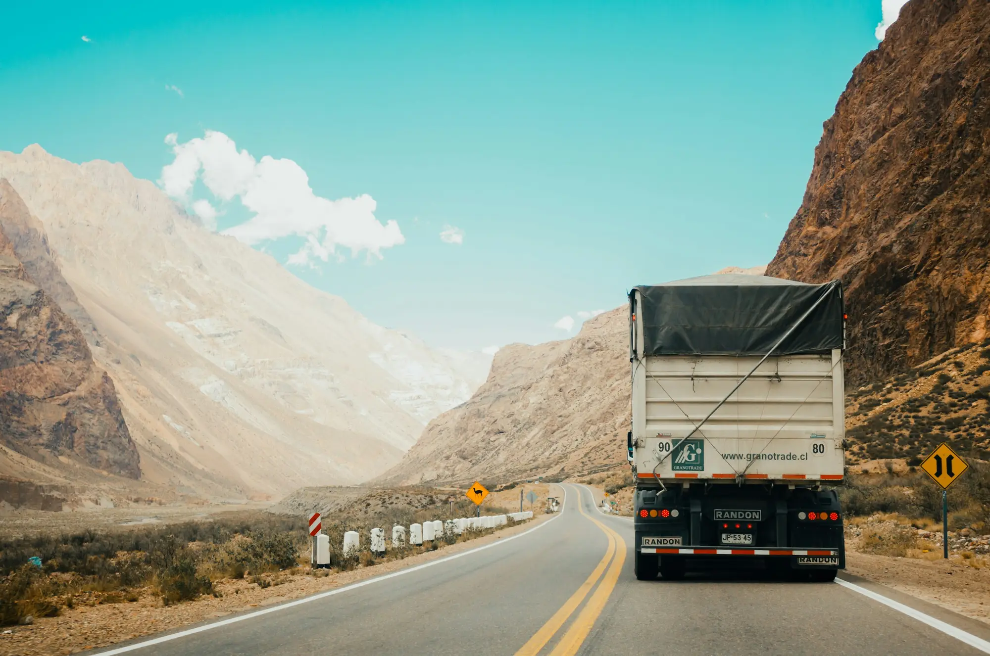 A truck on a mountain highway